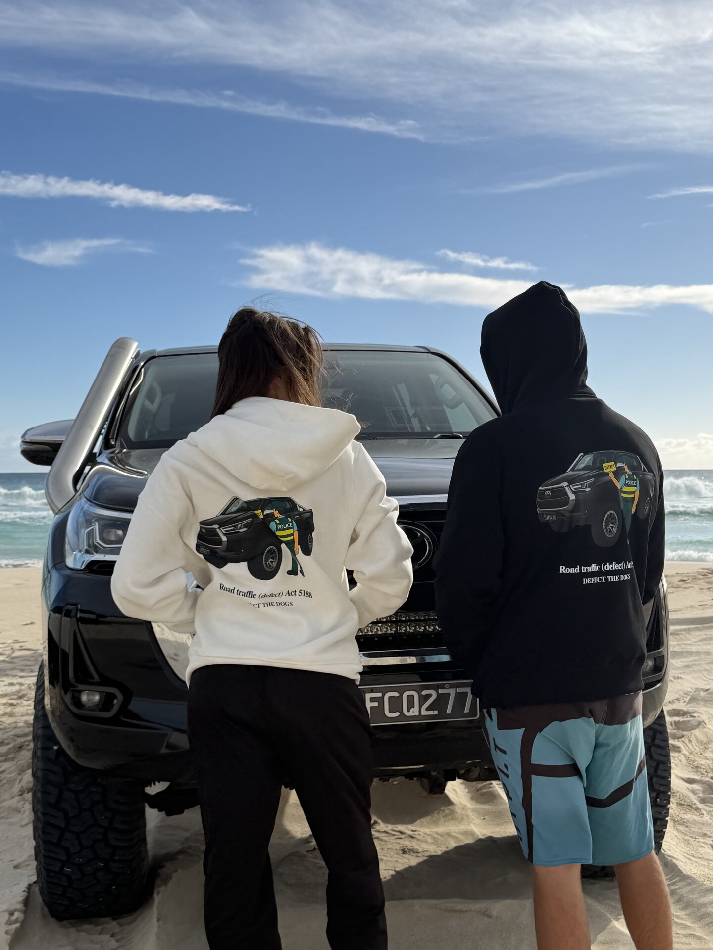 Custom 4x4 rig on a Perth beach at sunset